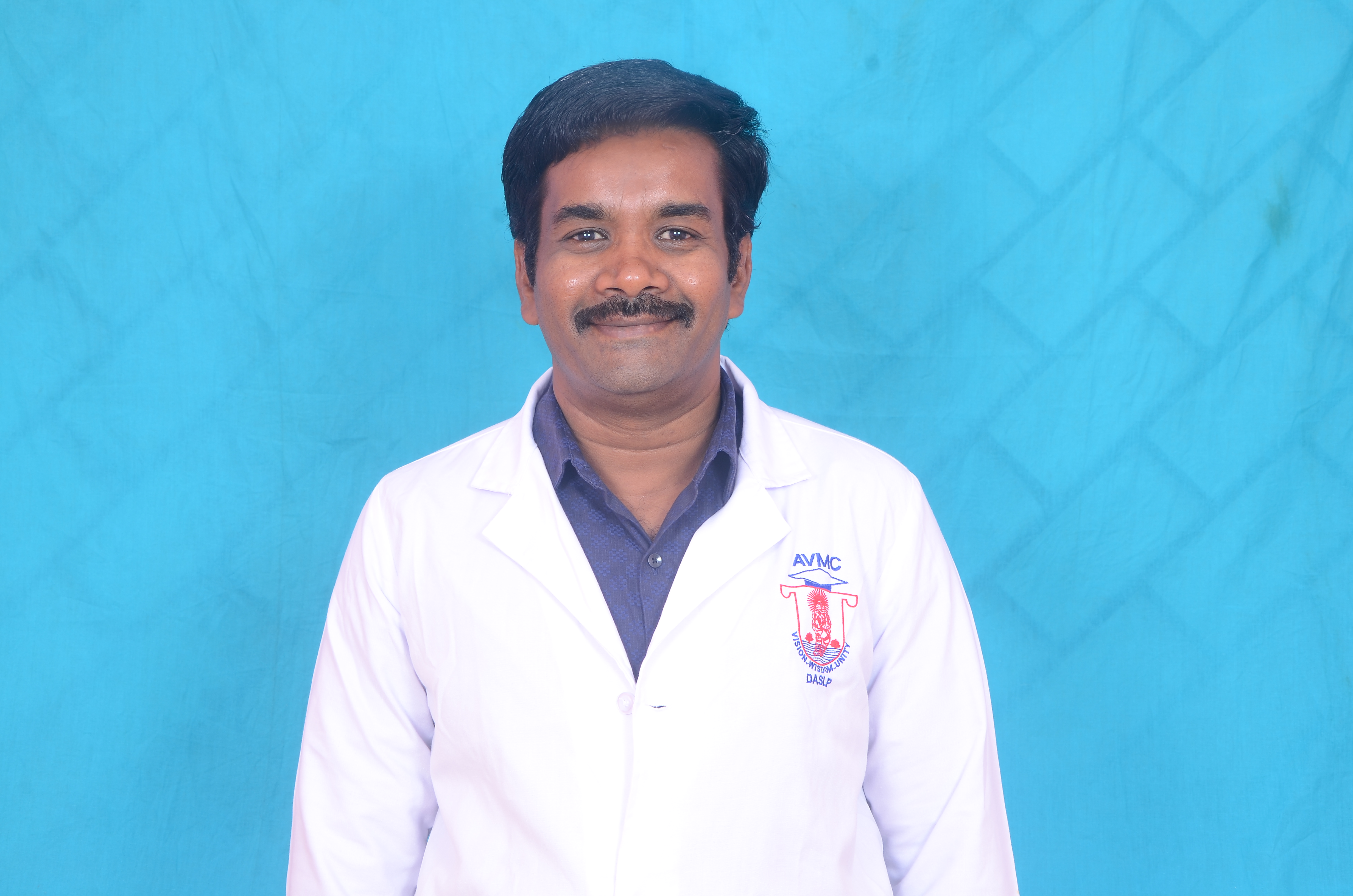 Dr. E. Sambandam